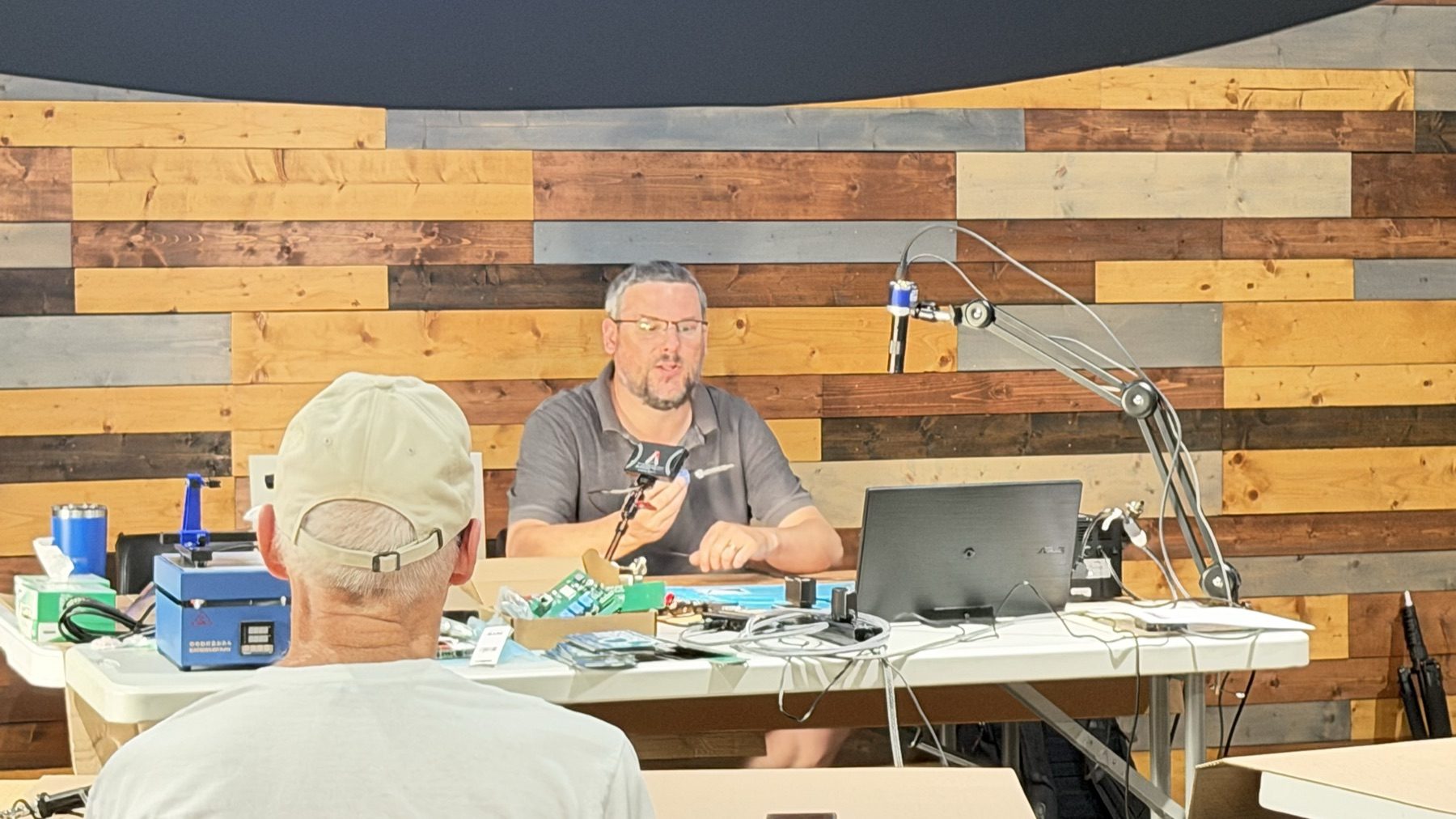Brett, W9TST, teaching the electronic soldering class at the Maker’s Space.