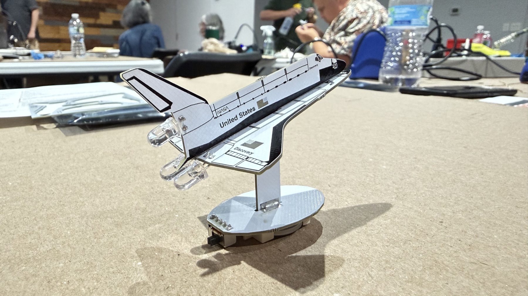 The completed Space Shuttle Discovery soldering kit standing on its PCB base.