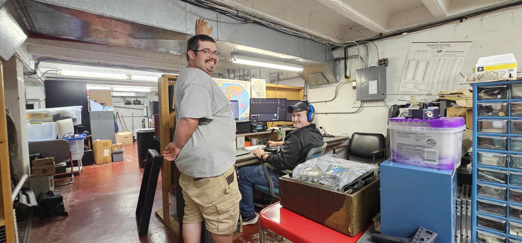 Two operators at the club station during the North American QSO Party.